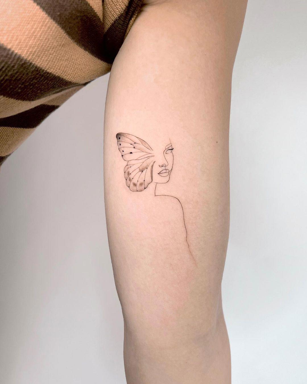 Tattoo mitad mariposa, mitad silueta de mujer